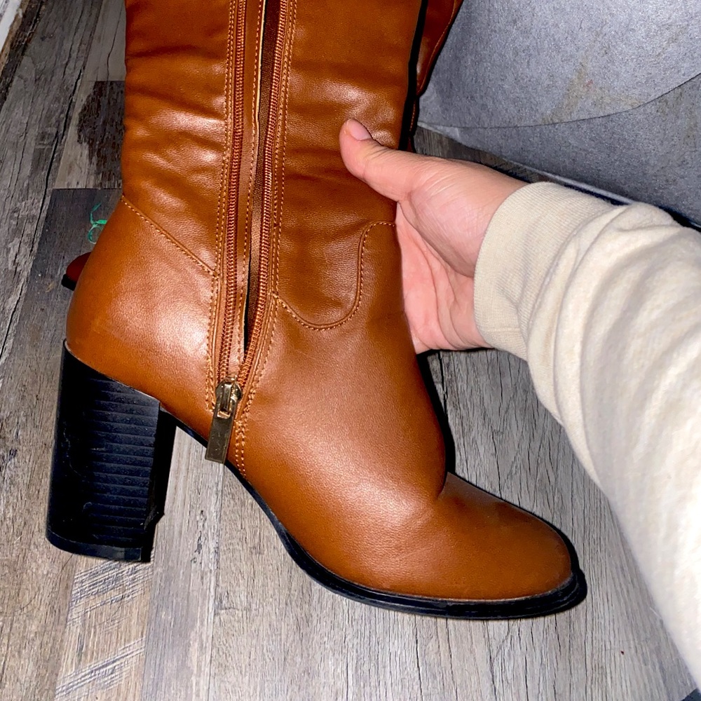 Thigh high leather heeled boots